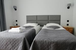 Postel nebo postele na pokoji v ubytování Willa Aniołówka