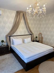 Кровать или кровати в номере Dream Apartment
