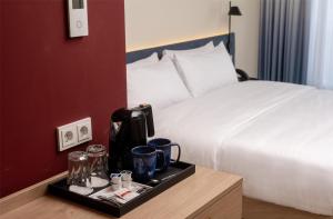 Hampton By Hilton Potsdam Babelsberg客房内的一张或多张床位