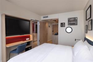 Hampton By Hilton Potsdam Babelsberg客房内的一张或多张床位