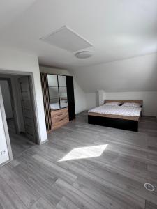 Postel nebo postele na pokoji v ubytování Vila Jesenice
