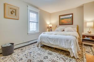 a bedroom with a bed and a window at Less Than 1 Mi to Xcel Energy Center Walkable Hideaway! in Saint Paul