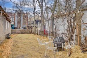 a group of chairs and a table in a yard at Less Than 1 Mi to Xcel Energy Center Walkable Hideaway! in Saint Paul