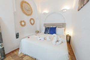 Ένα ή περισσότερα κρεβάτια σε δωμάτιο στο Riad Darna 4 chambres avec piscine et petit déjeuner +67 φωτογραφίες