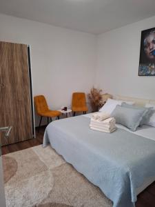 Posteľ alebo postele v izbe v ubytovaní B&B Buzolic