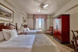 Postel nebo postele na pokoji v ubytování Hotel San Carlos