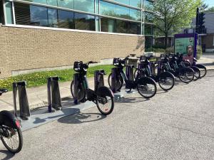 a row of bikes parked in front of a building at Aux Années Folles in Quebec City