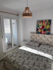 Postel nebo postele na pokoji v ubytování Apartment near Lungo Mare beach + 9 fotografií
