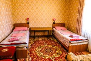 Postel nebo postele na pokoji v ubytování Guesthouse Klara
