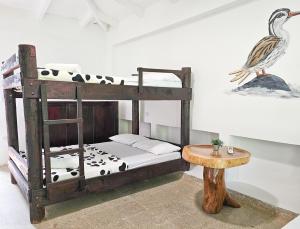 Voodi või voodid majutusasutuse EcoHotel El Castillo Pance toas