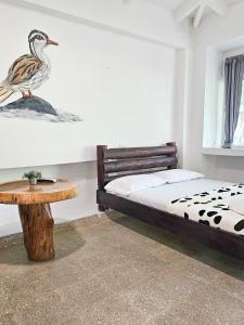 Voodi või voodid majutusasutuse EcoHotel El Castillo Pance toas
