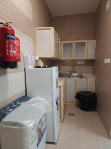 A cozinha ou cozinha compacta de شقة مستقلة غرفتين نوم وصالة طعام غرفة جلوس mais 17 fotos