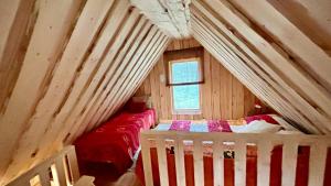 Ένα ή περισσότερα κρεβάτια σε δωμάτιο στο Merejuula Puhkemaja