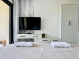 Uma cama ou camas num quarto em Cozy Studio Apt @ G-cribs El Gouna with a View.