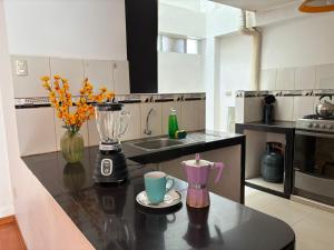 A cozinha ou kitchenette de Cusco Rooms