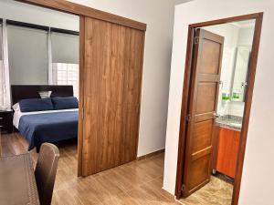 Postel nebo postele na pokoji v ubytování Casa Hotel Palermo 49