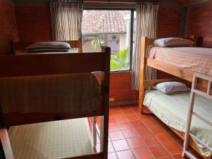 Postel nebo postele na pokoji v ubytování Hotel Aguablanca