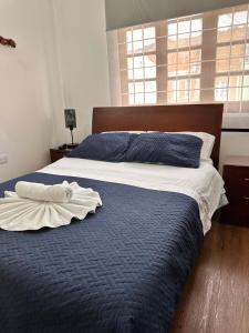 Postel nebo postele na pokoji v ubytování Casa Hotel Palermo 49