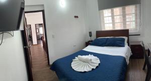 Postel nebo postele na pokoji v ubytování Casa Hotel Palermo 49