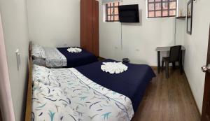 Postel nebo postele na pokoji v ubytování Casa Hotel Palermo 49