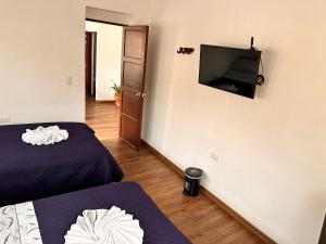 TV a/nebo společenská místnost v ubytování Casa Hotel Palermo 49