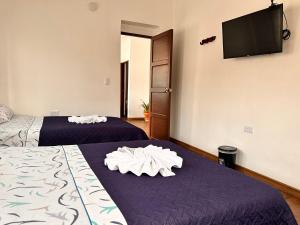 Postel nebo postele na pokoji v ubytování Casa Hotel Palermo 49