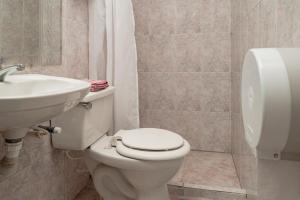 Koupelna v ubytování Innovar Casa Hostal