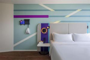 Voodi või voodid majutusasutuse Tru by Hilton Hanoi Station toas