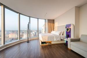 Voodi või voodid majutusasutuse Tru by Hilton Hanoi Station toas