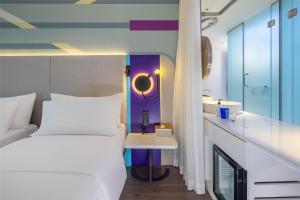 Voodi või voodid majutusasutuse Tru by Hilton Hanoi Station toas