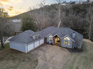 an overhead view of a house with a garage at Foggy River Retreat - For 16 in Hollister