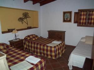 Posteľ alebo postele v izbe v ubytovaní Casas Rurales Jardines del Visir