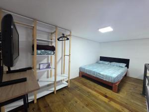 Katil atau katil-katil dalam bilik di Guaracuí Flat House
