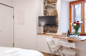 TV a/nebo společenská místnost v ubytování Suite Exclusive Room