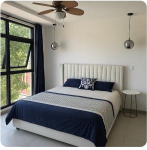 ein Schlafzimmer mit einem Bett und einem Deckenventilator in der Unterkunft Dormitorio con baño privado es Tu descanso en el corazón de San Salvador in San Salvador