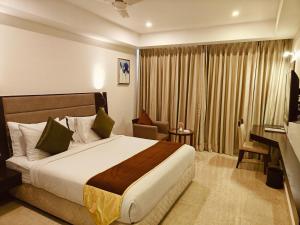 Postel nebo postele na pokoji v ubytování Khanna Fiesta - A Bergamont Hotel, Vellore + 158 fotografií