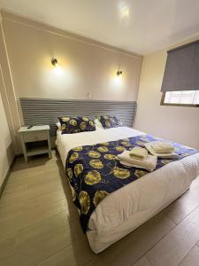 Letto o letti in una camera di Hotel Divasto