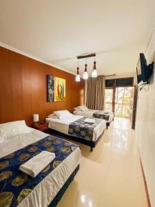Letto o letti in una camera di Hotel Divasto
