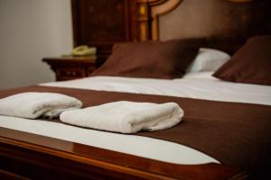 Letto o letti in una camera di Hotel Divasto