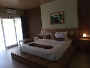 Postel nebo postele na pokoji v ubytování Maya Ocean Resort