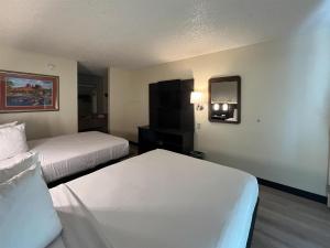 Postel nebo postele na pokoji v ubytování Motel 6 Las Vegas, NV - Strip