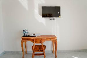 TV/trung tâm giải trí tại Pondok Dayuh Homestay