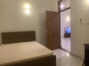 Postel nebo postele na pokoji v ubytování Homestay