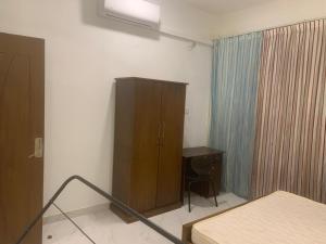 Postel nebo postele na pokoji v ubytování Homestay + 2 fotografie