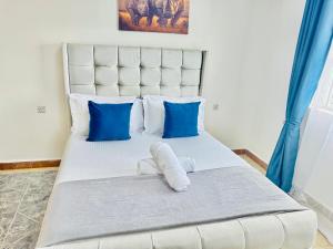 Postel nebo postele na pokoji v ubytování Serene Escapade