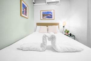 Postel nebo postele na pokoji v ubytování Room 9 Sleek & Serene Stay in San Juan