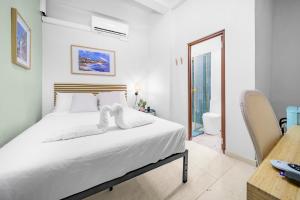 Postel nebo postele na pokoji v ubytování Room 9 Sleek & Serene Stay in San Juan