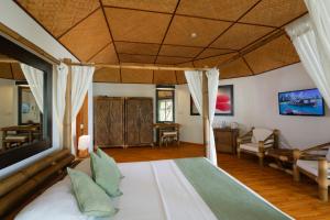 Uma cama ou camas num quarto em Safari Island