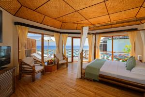 Uma cama ou camas num quarto em Safari Island