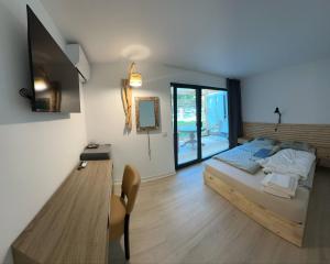 En eller flere senge i et værelse på Blues House